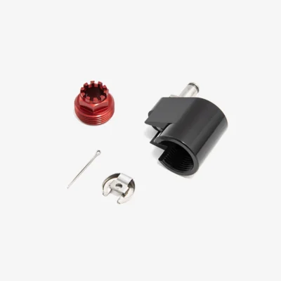 Assorted small metal hardware parts including red anodized threaded piece, black plastic clamp, cotter pin, and a silver retaining clip.